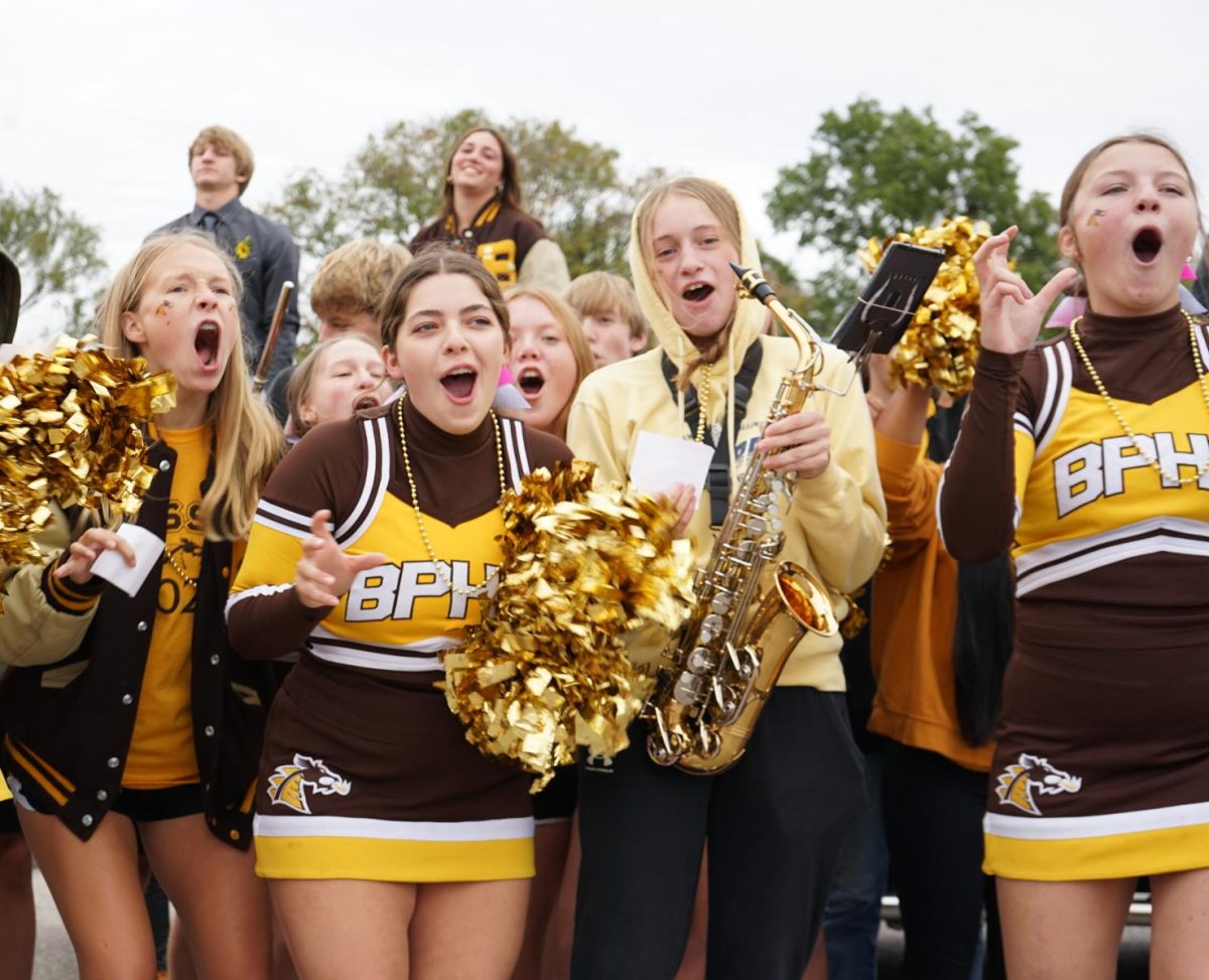 Sophomores Roar the end of their winning chant to their opponent classes at the downtown pep rally. 